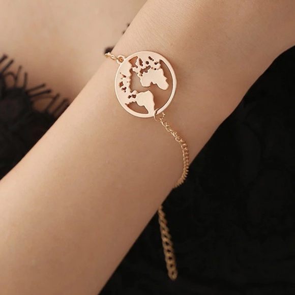 Jewelry - NEW world globe bracelet in gold